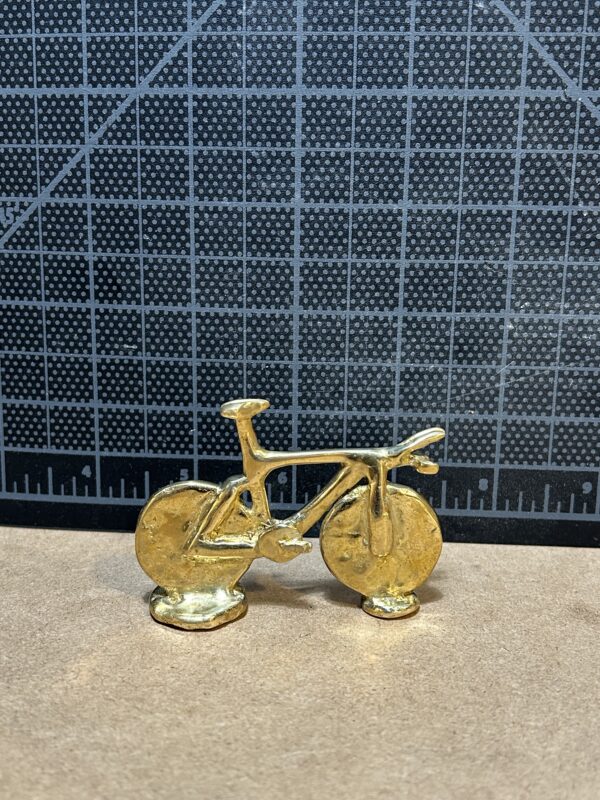 Artist: Gunnar Stukuls  Title: Brass Bicycle Medium: Brass Grade: 10th School: Miramonte High School Teacher: Gavin Kermode Price: NFS