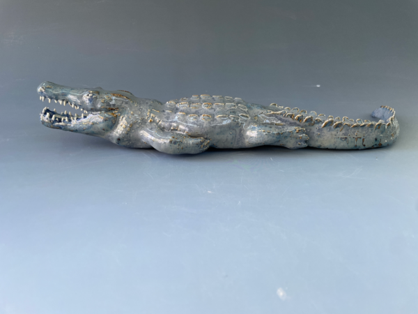 Artist: River Maniatis  Title: Sea Break Crocodile Medium: Clay, Glaze Grade: 11th School: Bentley Upper School Teacher: Joanne Ludwig Price: NFS