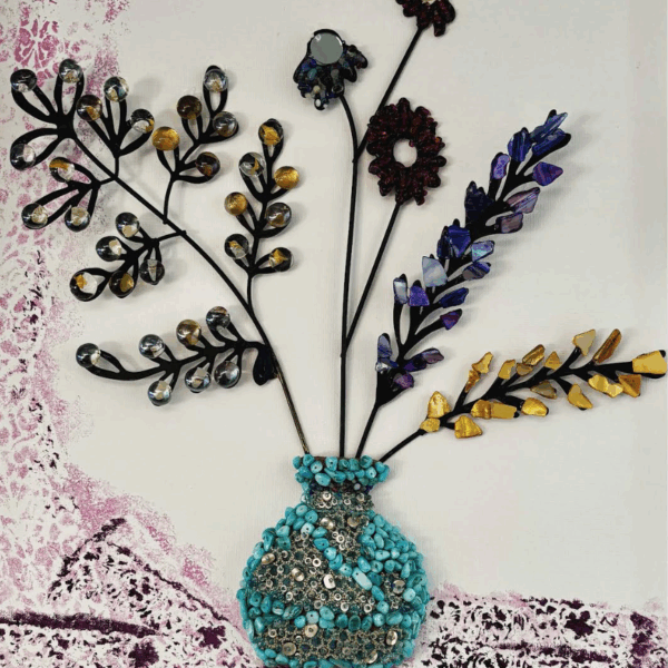 Mosaic depicting a blue vase. Several flowers with long stems lean out of the vase.