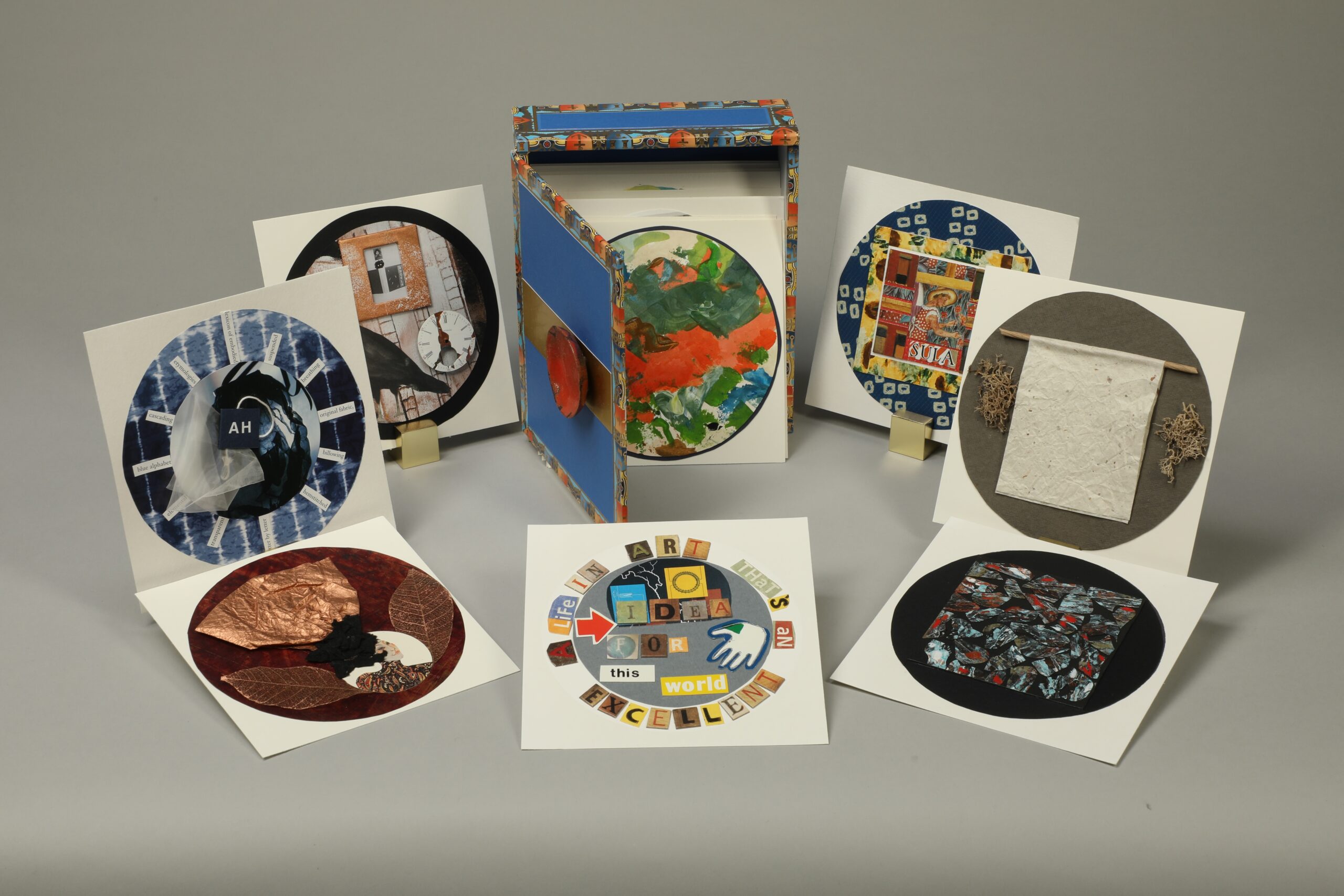 Image showing a group of colorful circular objects resembling CDs.