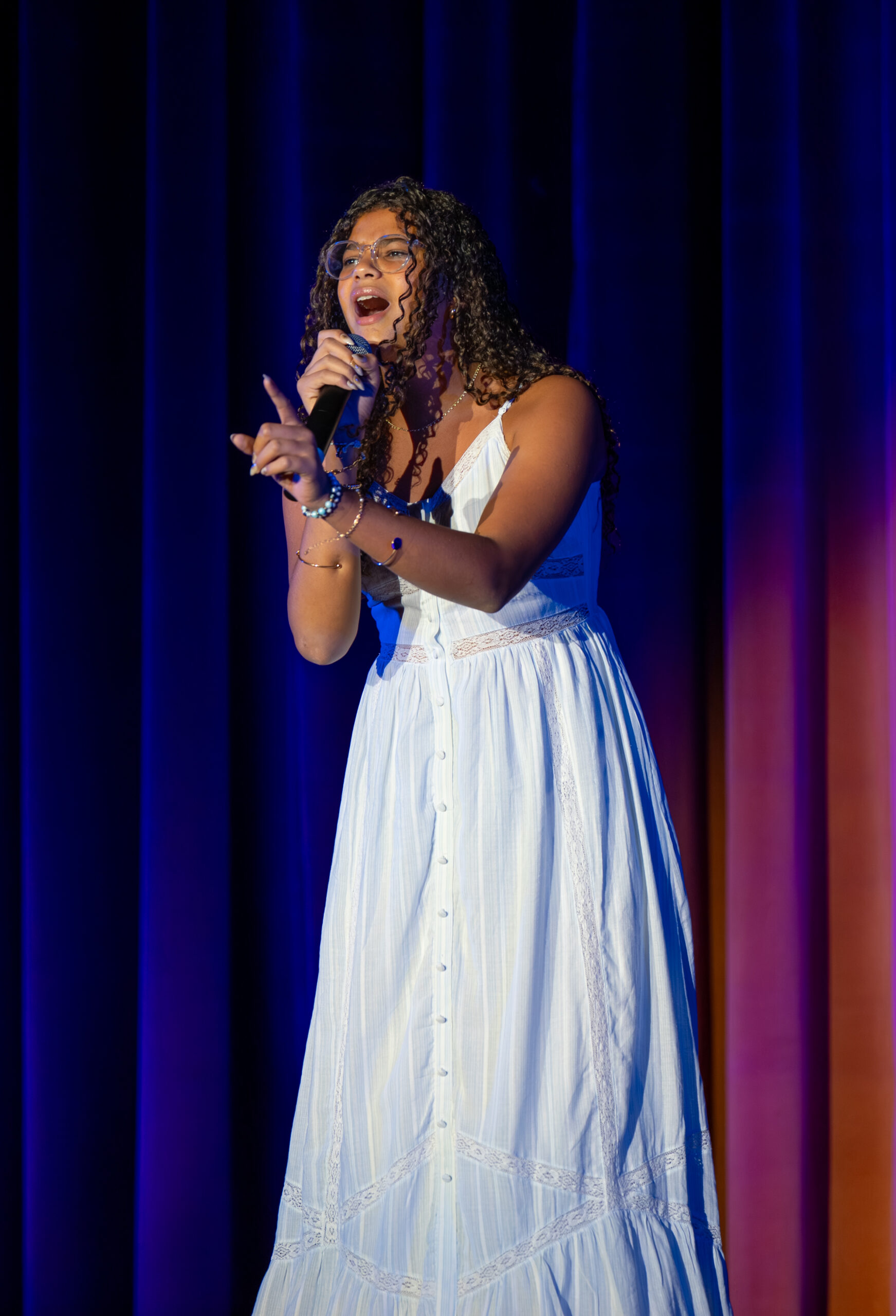 Photograph showing a girl singing