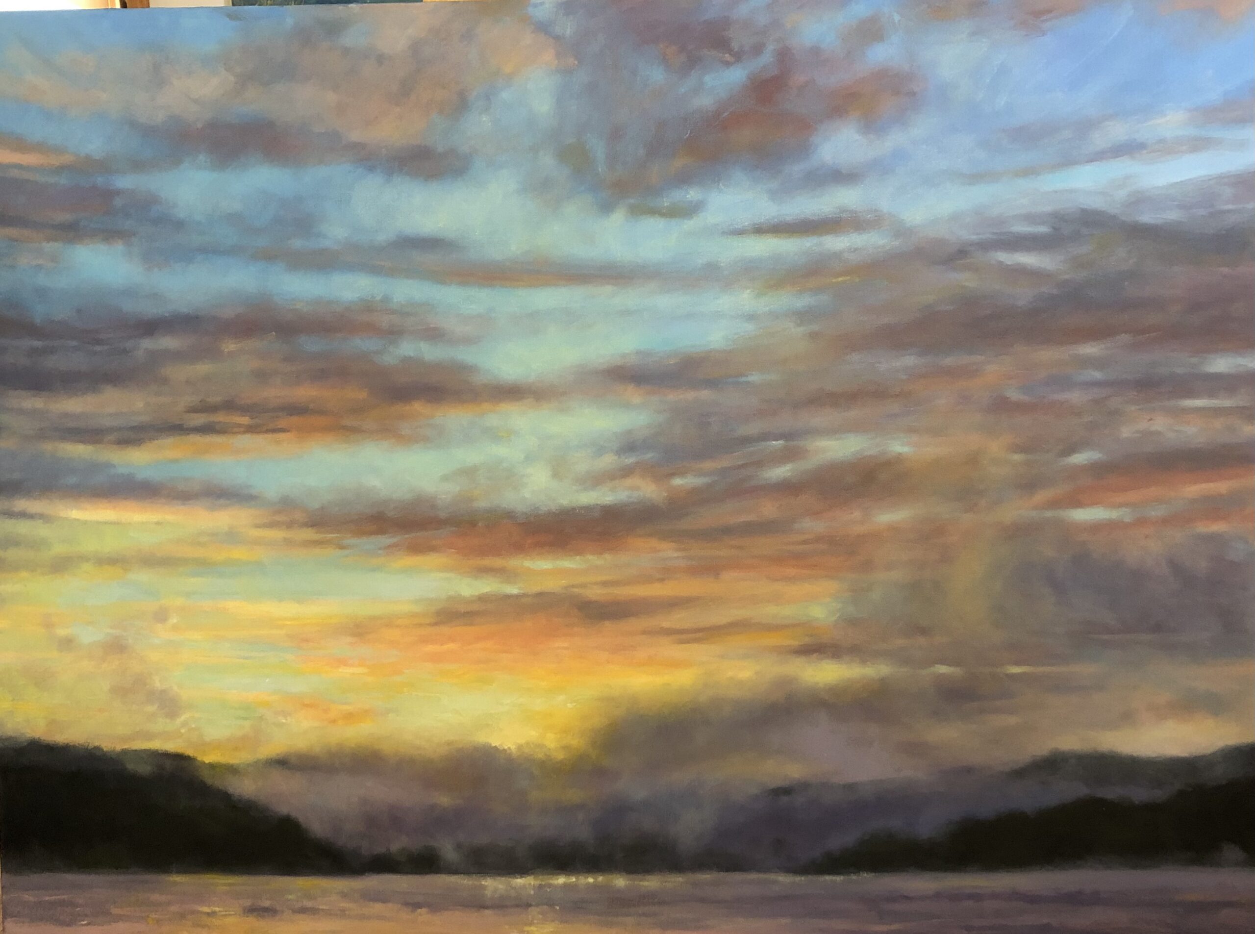 Painting showing a golden sunrise against a sky full of clouds. Water is visible below.