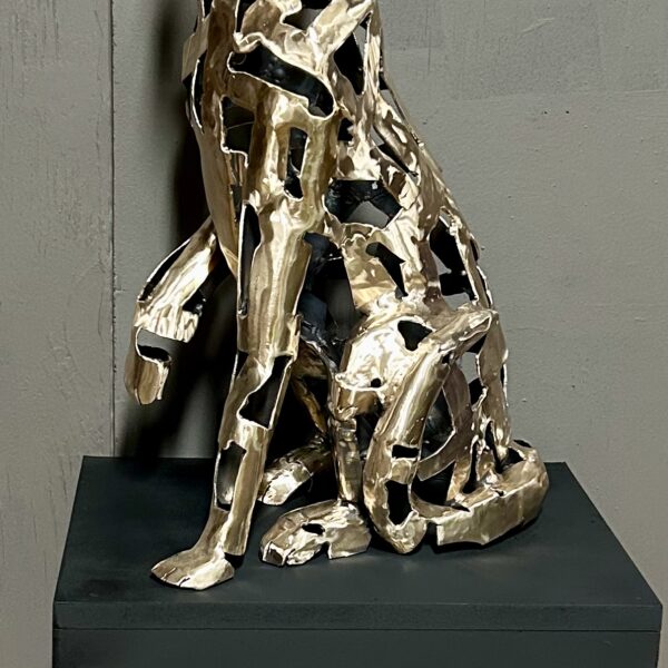 Photograph showing bronze sculpture of a cat.