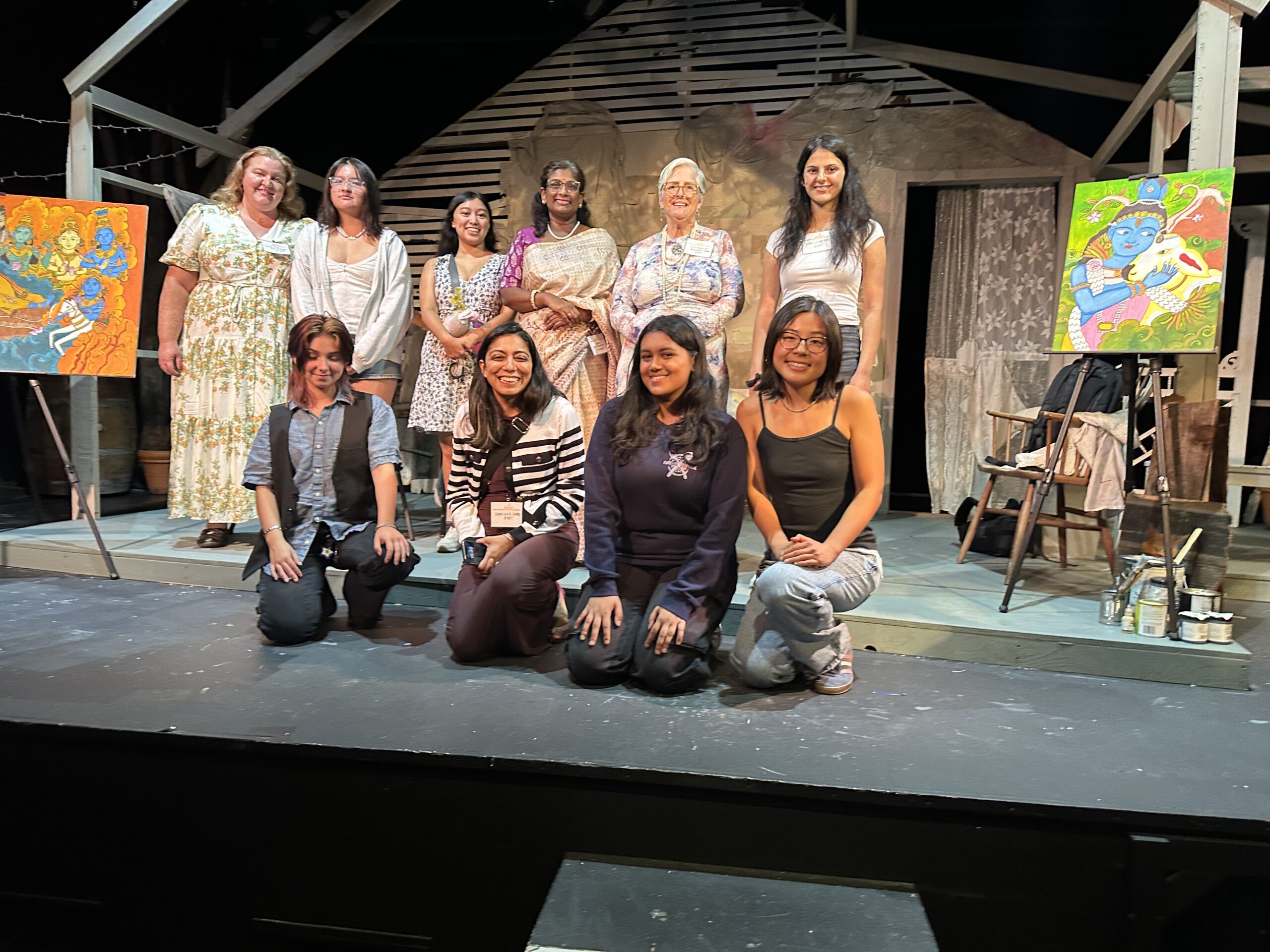 Photo depicting group of poets on a stage