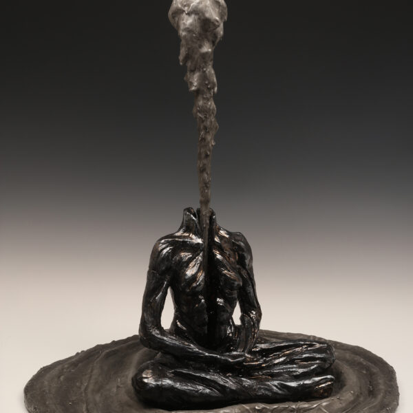 Image showing metal sculpture of a seated human figure. In place of a head, the figure has a column of smoke.