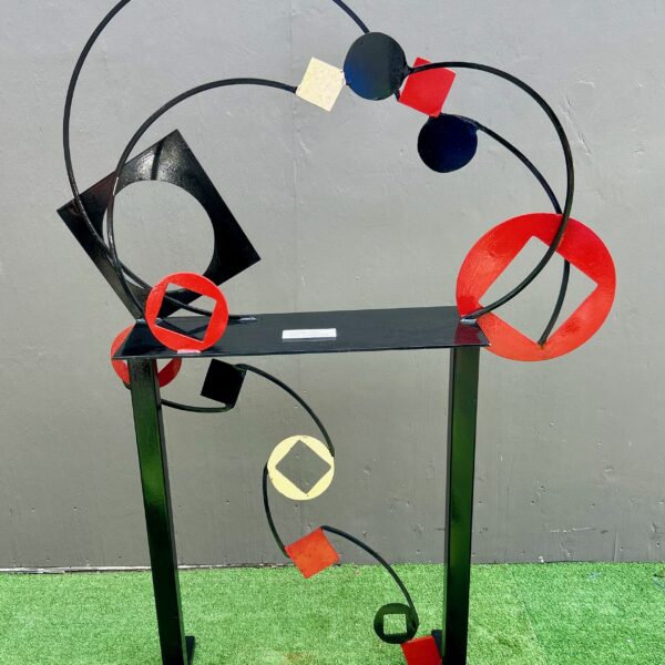 Image showing sculpture with many abstract pieces in black, white and red